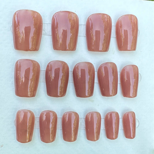 set of press on nail dark brown color have 30 pcs in the set. and 2 shapes to order square and almond.  samples on a white card with grass in the background